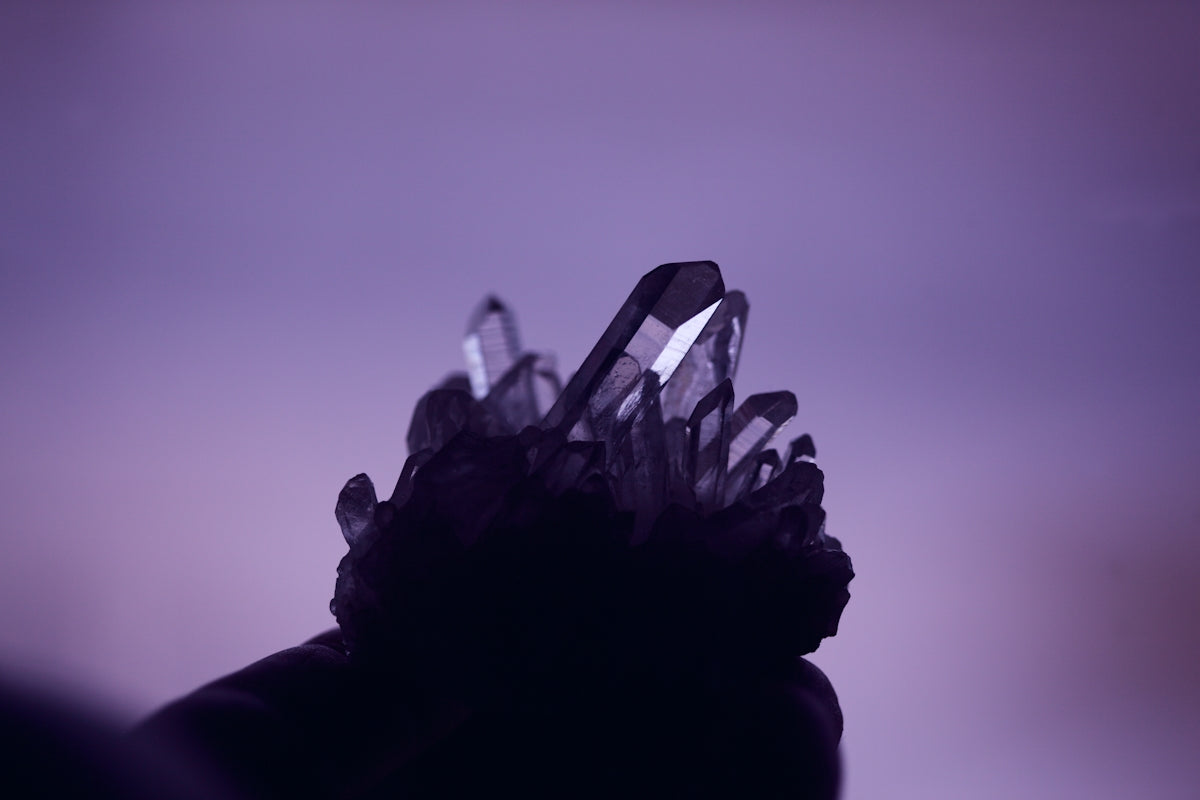 Ten essential crystals for a Wiccan altar including clear quartz, amethyst, and moonstone