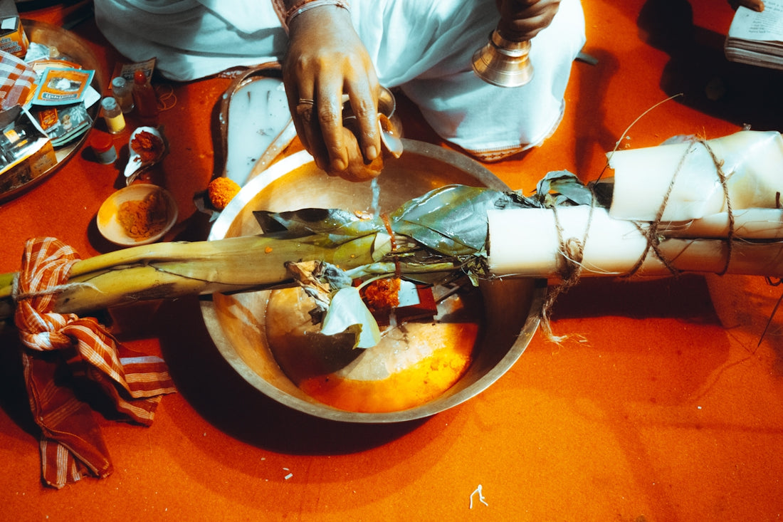 a person sitting at a table with a bowl of food