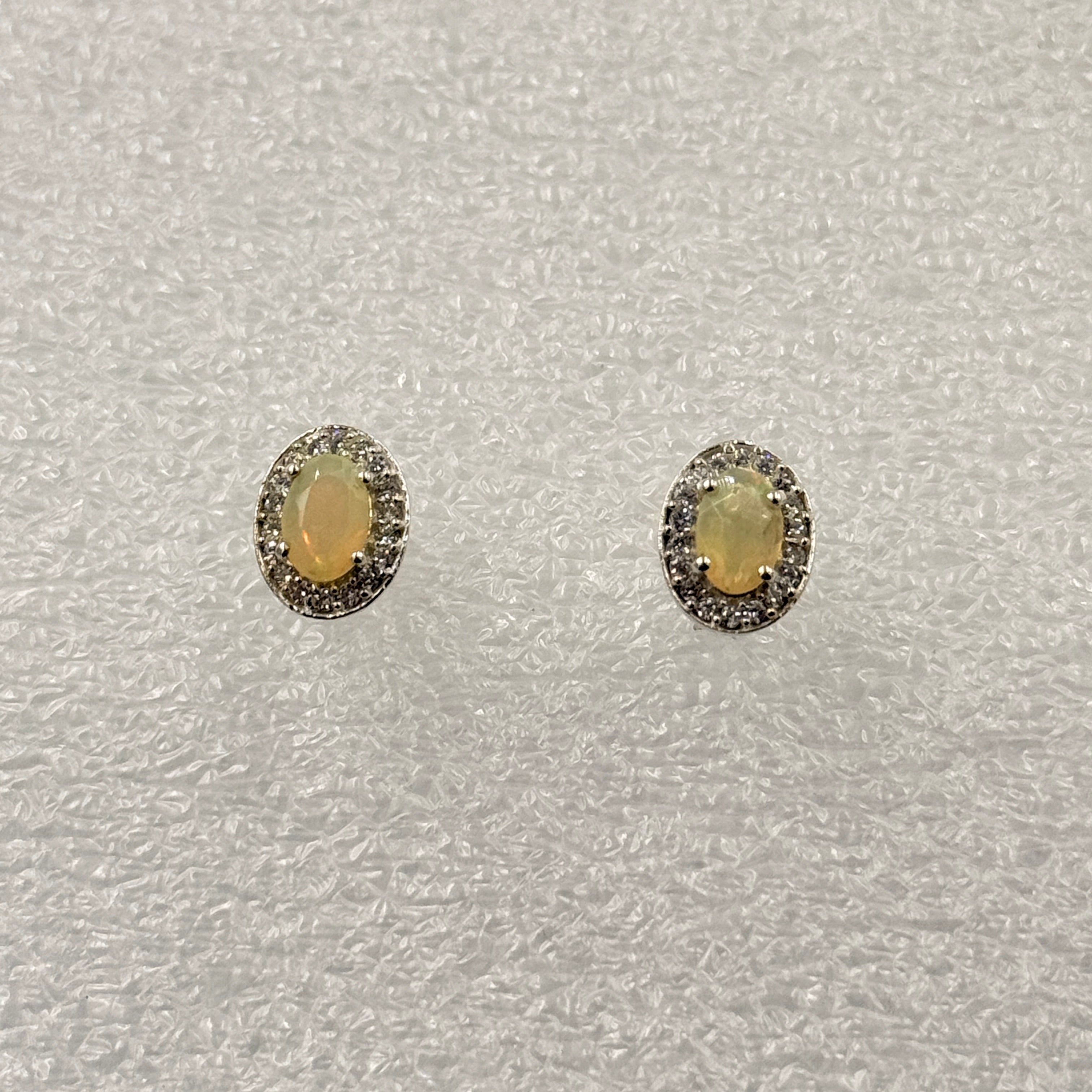 Sterling Silver Halo Oval Ethiopian Opal Post Earrings | Earrings | Wiccan Center