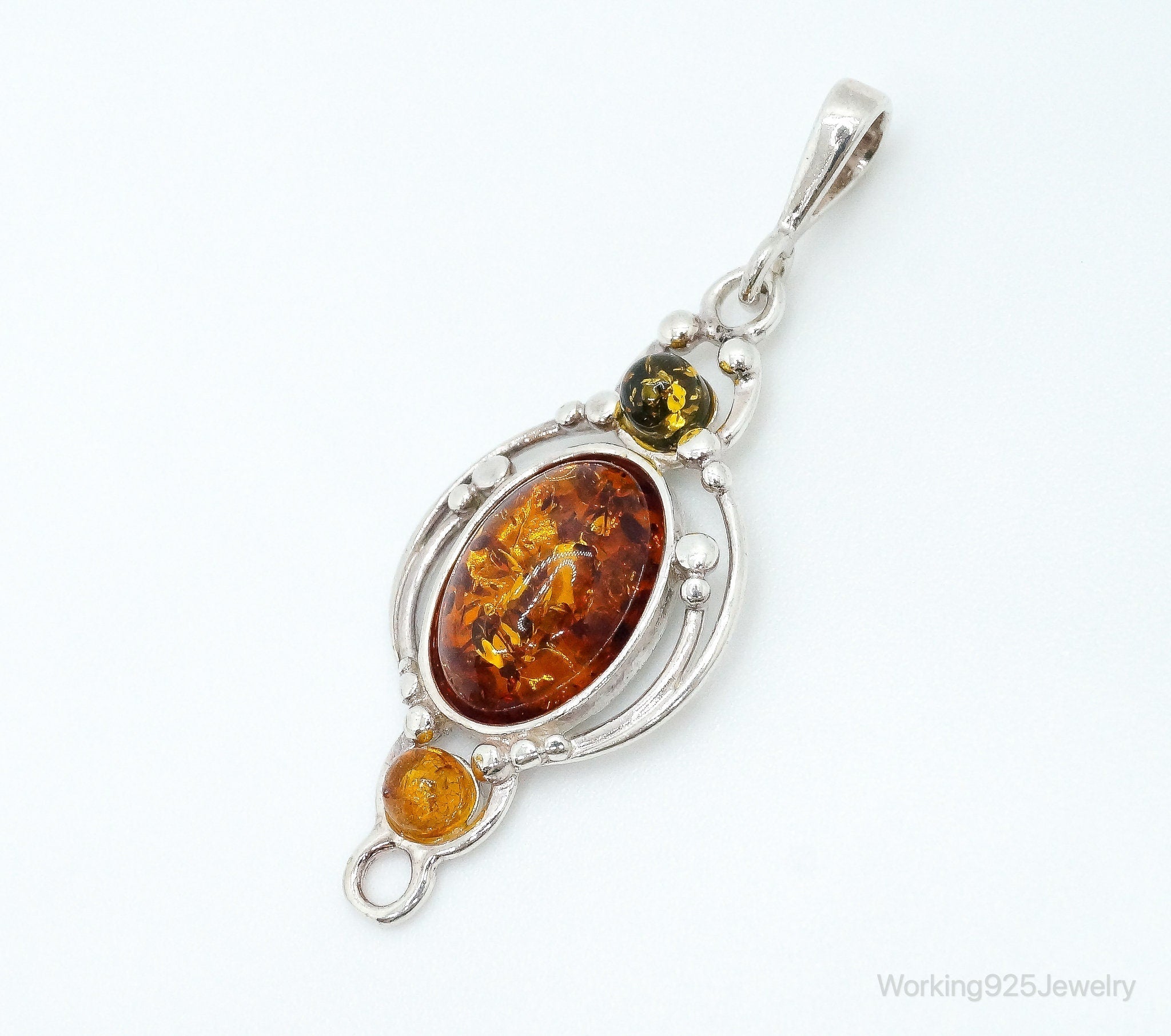 Vintage Multi Type Amber Sterling Silver Necklace Pendant | Jewelry > Necklaces > Pendants | Wiccan Center
