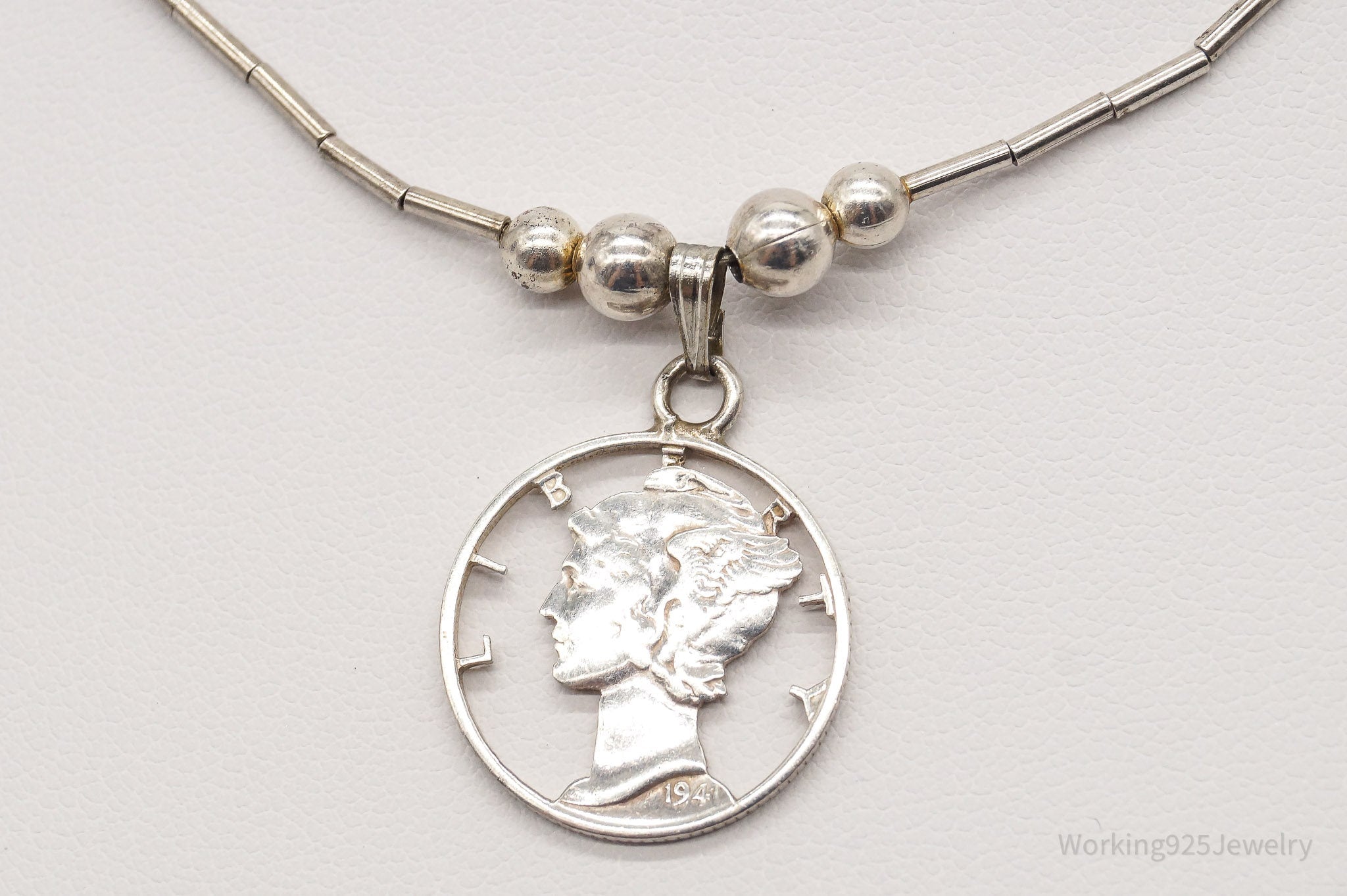 Vintage 1941 Mercury Dime Coin Cut Out Pendant Silver Necklace | Jewelry > Necklaces > Pendants | Wiccan Center