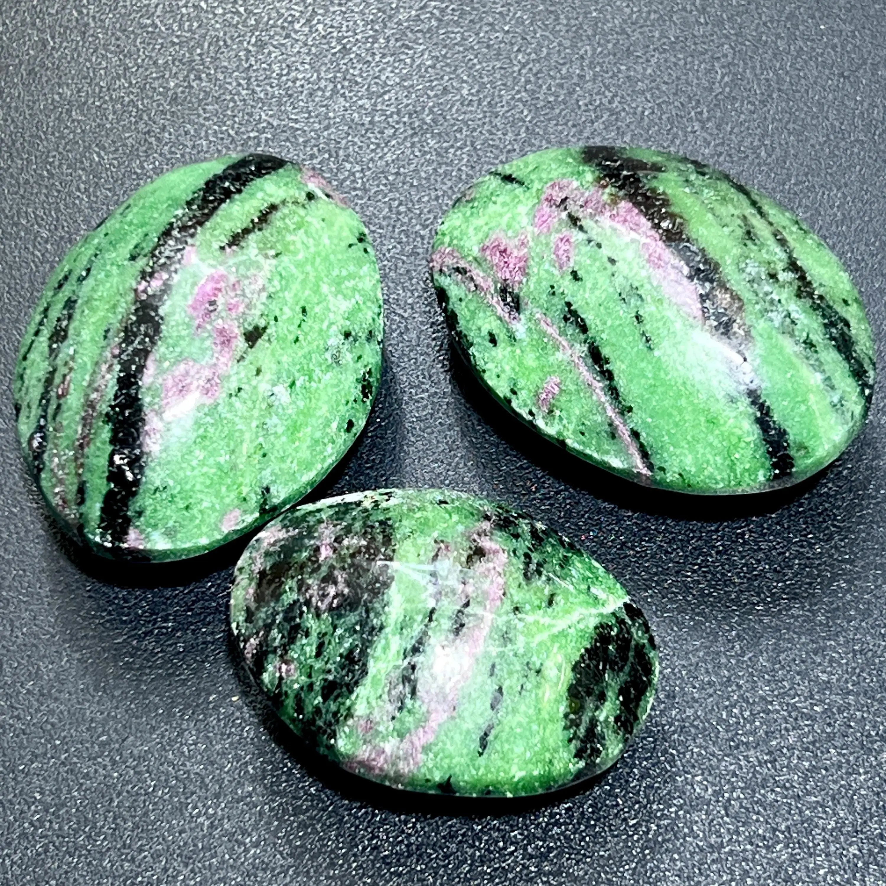 Ruby Zoisite Anyolite Crystal Palm Stones (UV Reactive) Carving | Home & Living > Home Decor > Home Accents > Rocks & Geodes | Wiccan Center