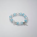 Boho Blue And Clear Crackled Glass Beads With Silver Ribbon Charms Elastic Bracelet | bracelet | Wiccan Center