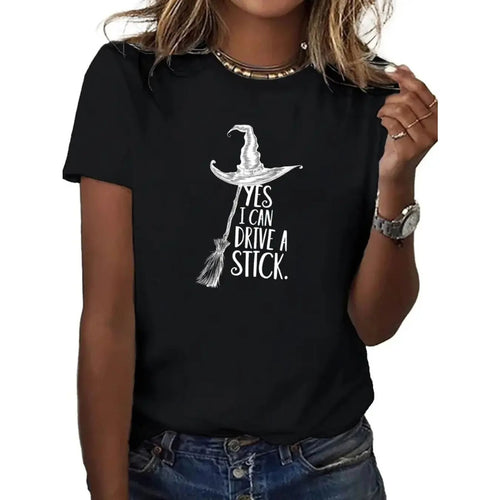 "Yes I Can Drive a Stick" Witch T-Shirt - Funny Halloween Graphic Tee, Women's All-Season Apparel | T-Shirt | Wiccan Center