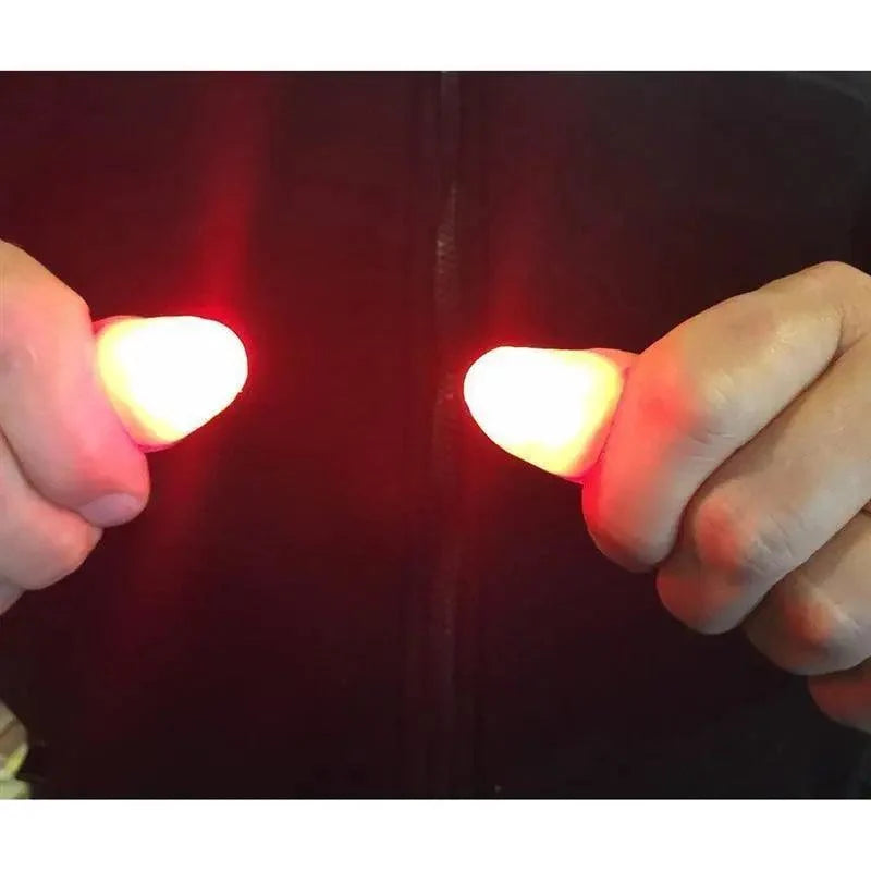 2pcs Red Lightup Magic Thumbs LED Magic Fingers Tricks Thumb Props Amazing Ultra Bright Light Festival Party Toys Illusion Magic Gadgets | STIL1558MAGCP | Wiccan Center