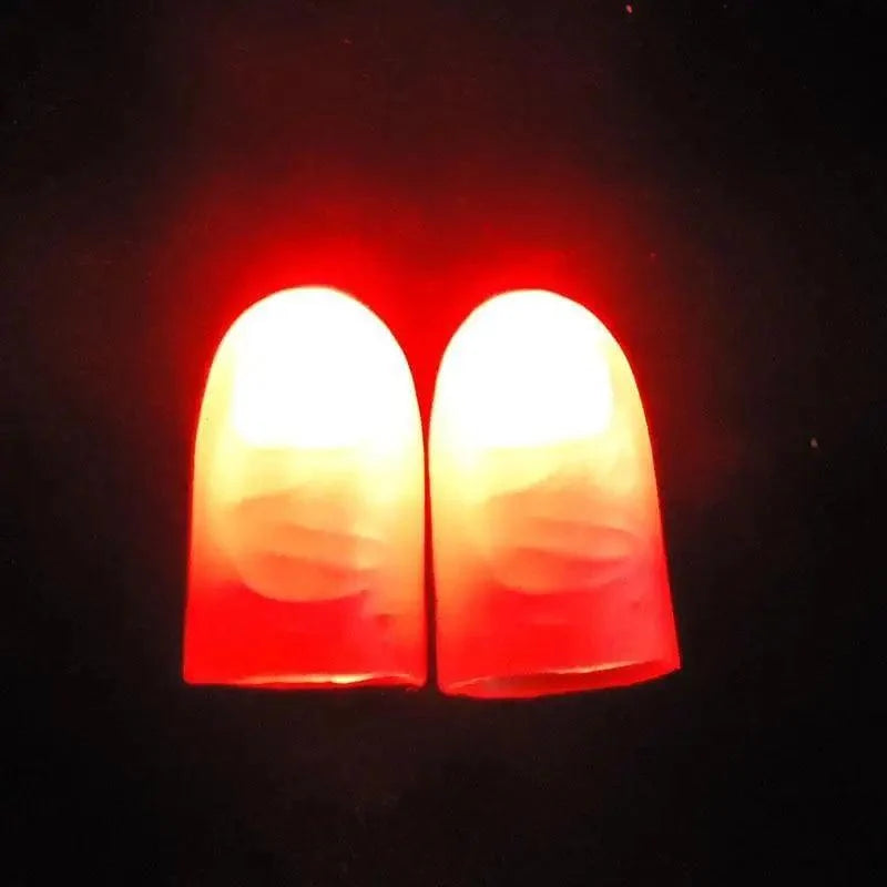 2pcs Red Lightup Magic Thumbs LED Magic Fingers Tricks Thumb Props Amazing Ultra Bright Light Festival Party Toys Illusion Magic Gadgets | STIL1558MAGCP | Wiccan Center