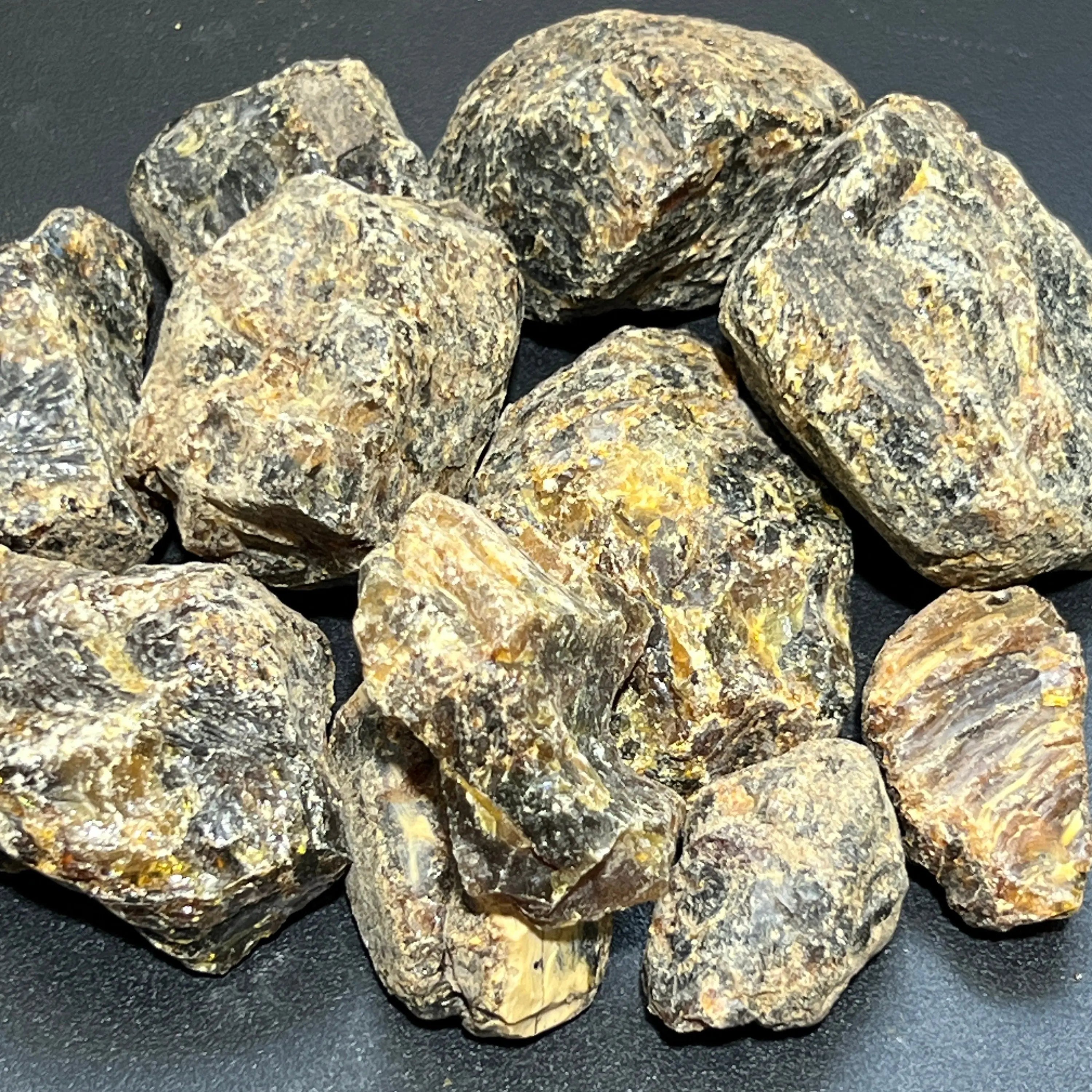 Black Amber Fossilized Tree Resin Mixed Sizes Rough Raw Stones (By The Piece or Pound)(UV Reactive) Wholesale | Home & Living > Home Decor > Home Accents > Rocks & Geodes | Wiccan Center