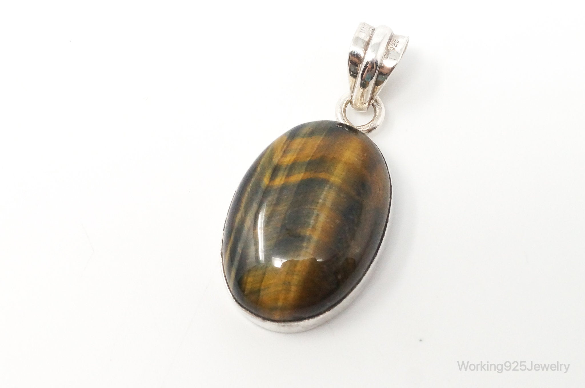Vintage Large Tigers Eye Southwestern Style Sterling Silver Pendant | Jewelry > Necklaces > Pendants | Wiccan Center