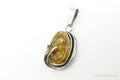 Vintage Honey Amber Modernist Sterling Silver Necklace Pendant | Jewelry > Necklaces > Pendants | Wiccan Center