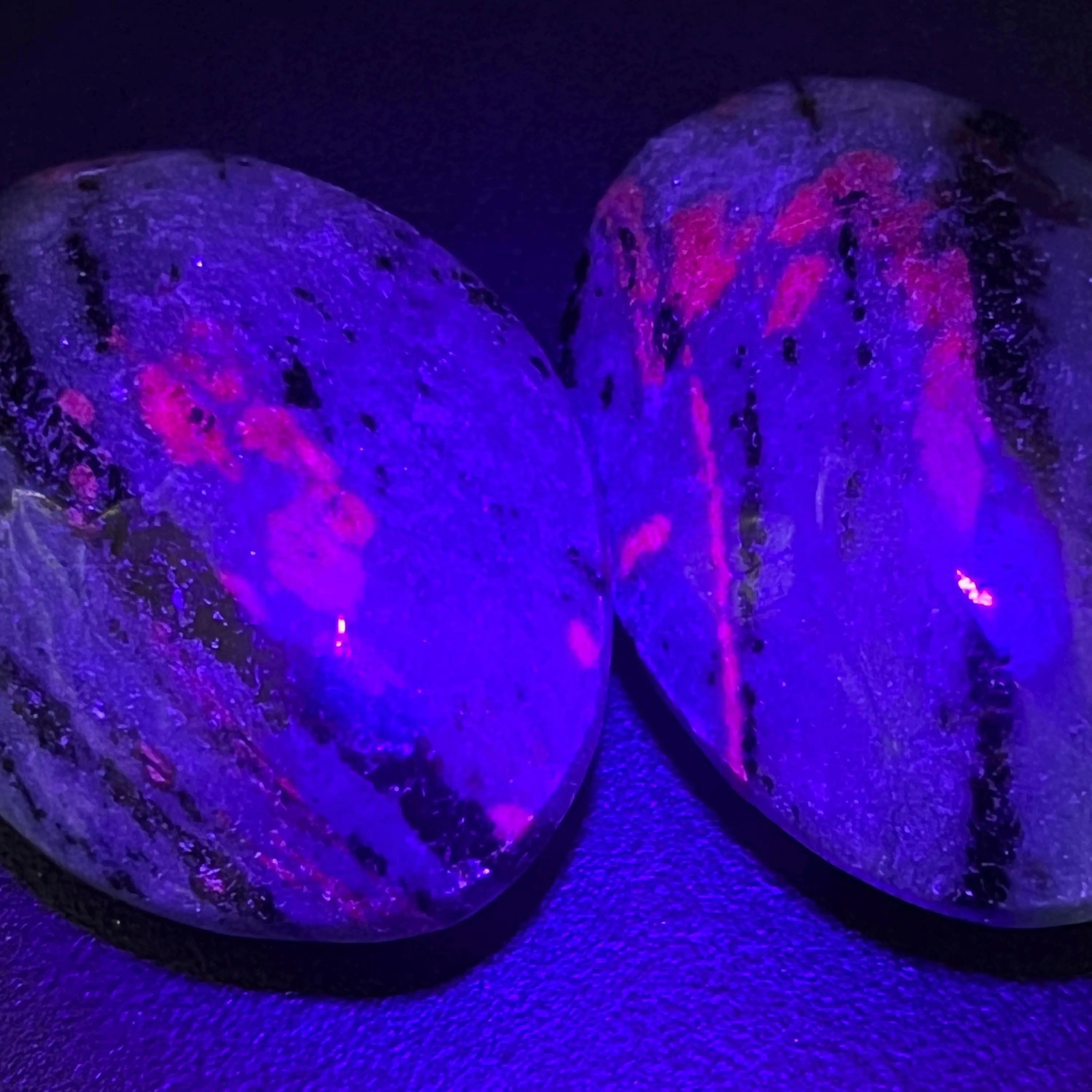 Ruby Zoisite Anyolite Crystal Palm Stones (UV Reactive) Carving | Home & Living > Home Decor > Home Accents > Rocks & Geodes | Wiccan Center