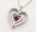 Vintage Designer SUN Ruby Cubic Zirconia Heart Sterling Silver Necklace | Jewelry > Necklaces > Pendants | Wiccan Center