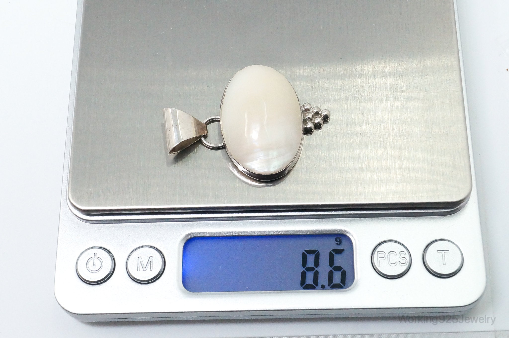 Large Native American Navajo Jason Livingston Pearl Sterling Silver Pendant | Jewelry > Necklaces > Pendants | Wiccan Center