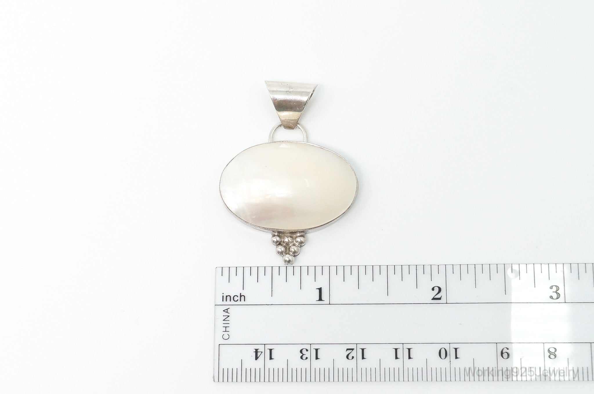 Large Native American Navajo Jason Livingston Pearl Sterling Silver Pendant | Jewelry > Necklaces > Pendants | Wiccan Center