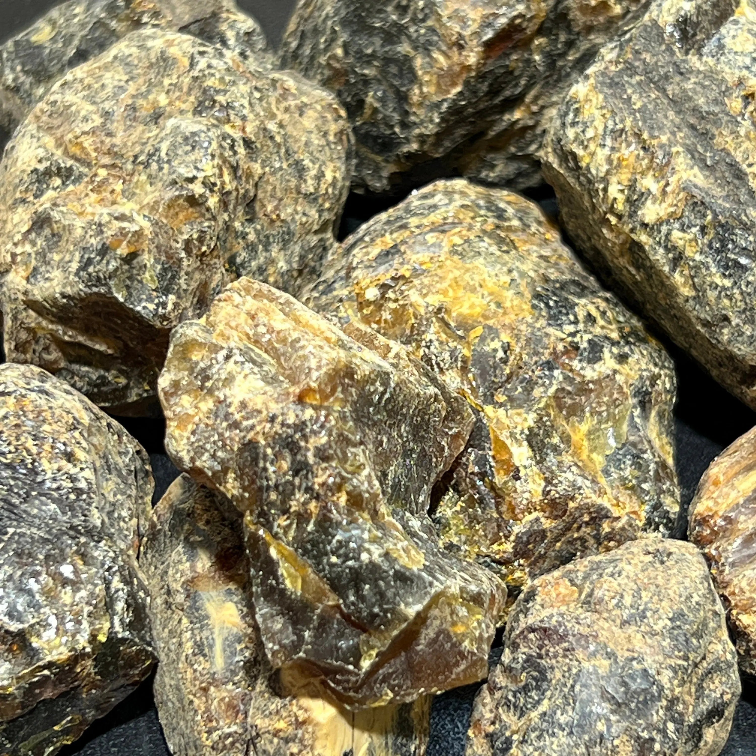 Black Amber Fossilized Tree Resin Mixed Sizes Rough Raw Stones (By The Piece or Pound)(UV Reactive) Wholesale | Home & Living > Home Decor > Home Accents > Rocks & Geodes | Wiccan Center