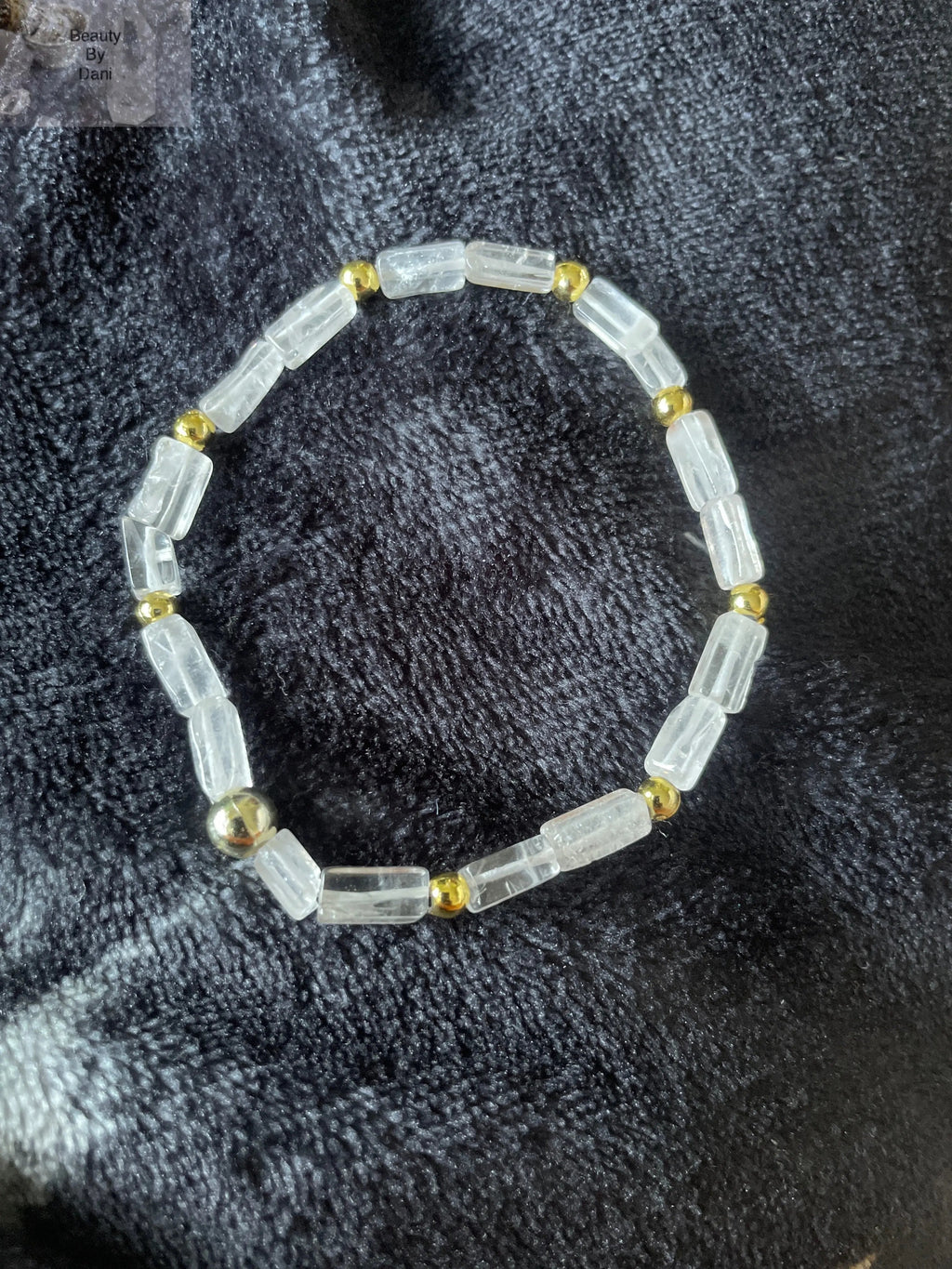 Crystal Quartz Stretch Bracelet with Gold Tone Accents