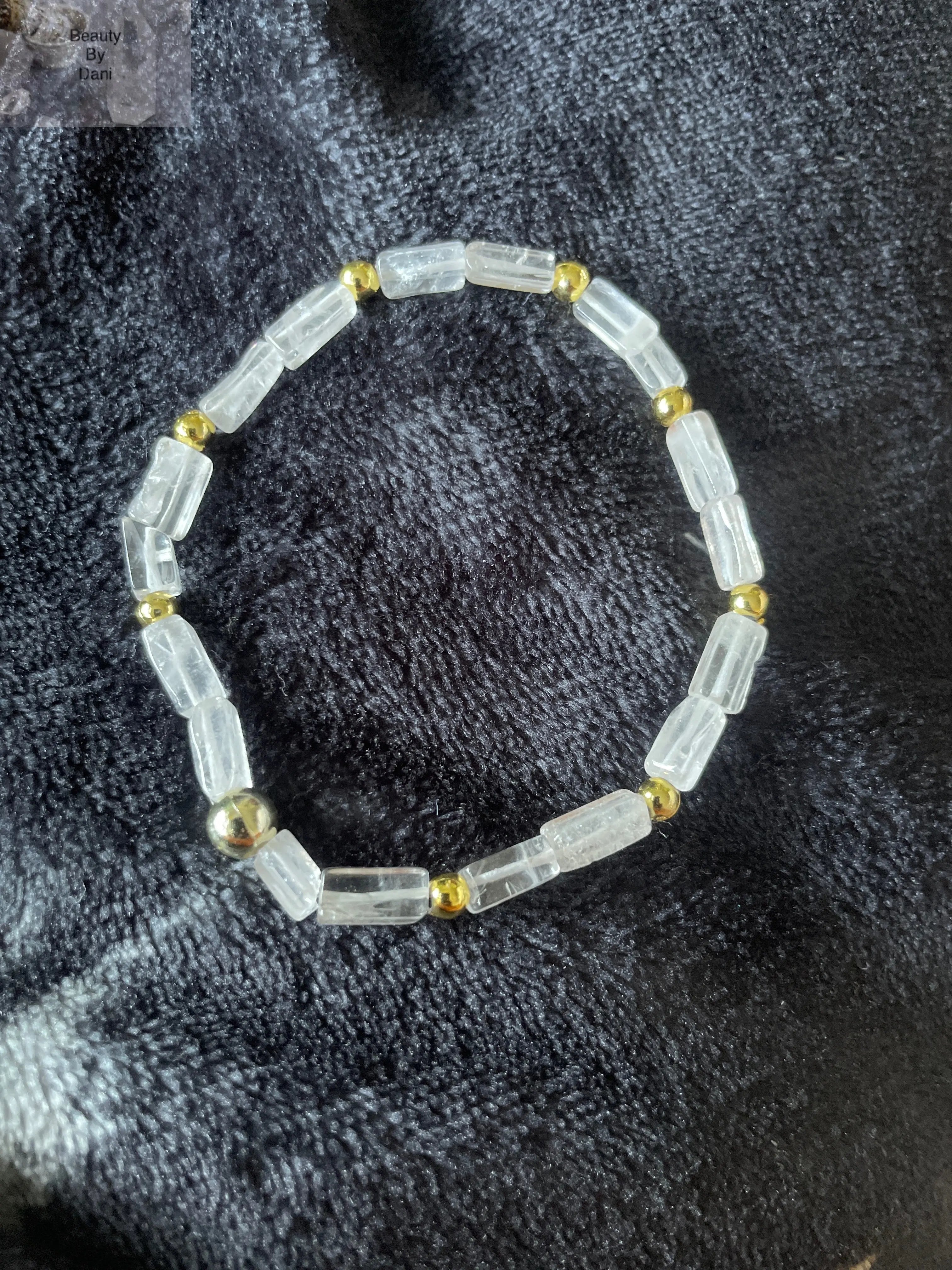 Crystal Quartz Stretch Bracelet with Gold Tone Accents
