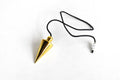 Cone with Round Brass Pendulum Silver Metal Pendulums.