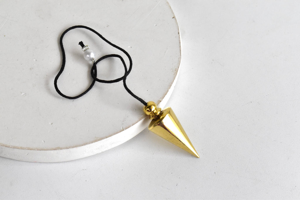 Cone with Round Brass Pendulum Silver Metal Pendulums.