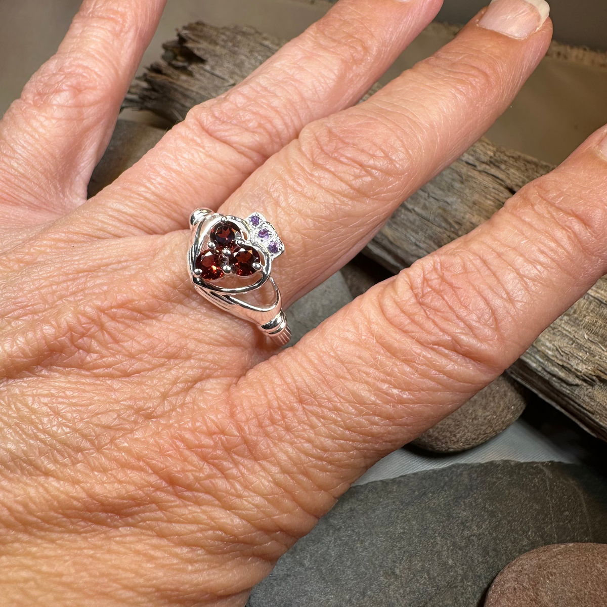 Irish True Love Garnet Claddagh Ring in Sterling Silver
