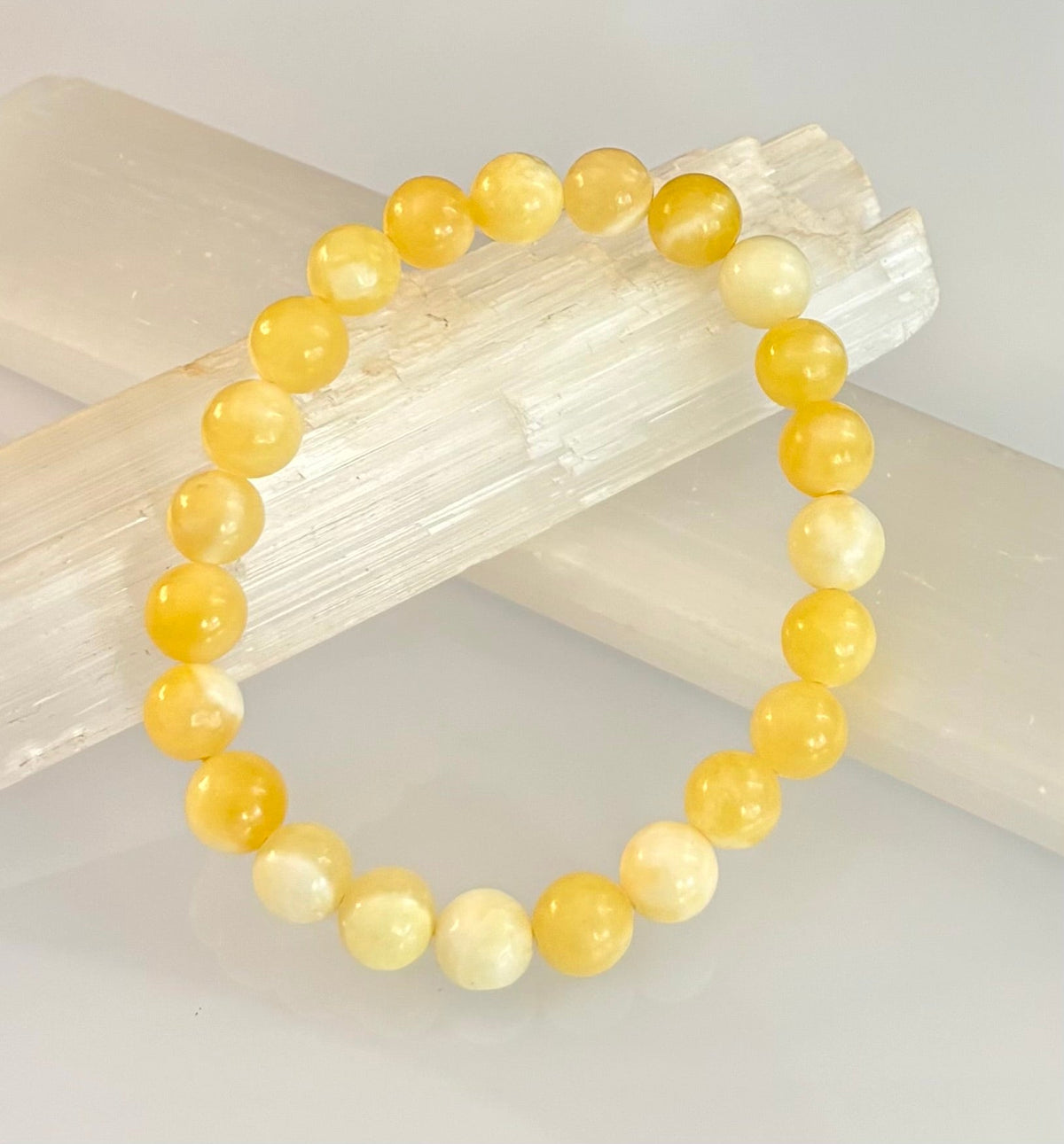 Citrus Sol: Natural Orange Calcite 8mm Crystal Stretch Bracelet | | Wiccan Center