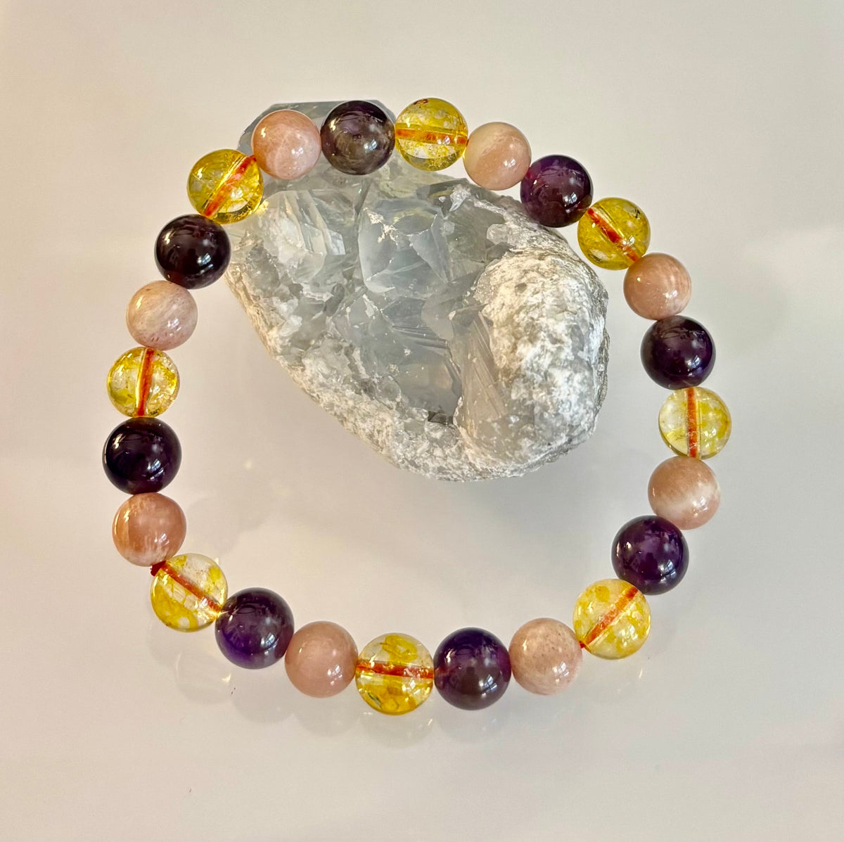 Cosmic Nurture: Amethyst, Peach Moonstone & Citrine Intuitive Manifestation Bracelet | | Wiccan Center