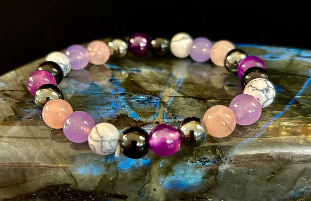 The Empaths Recharge Bracelet (amethyst, Clear Quartz, Rose Quartz, White Howlite, Black Tourmaline) | | Wiccan Center