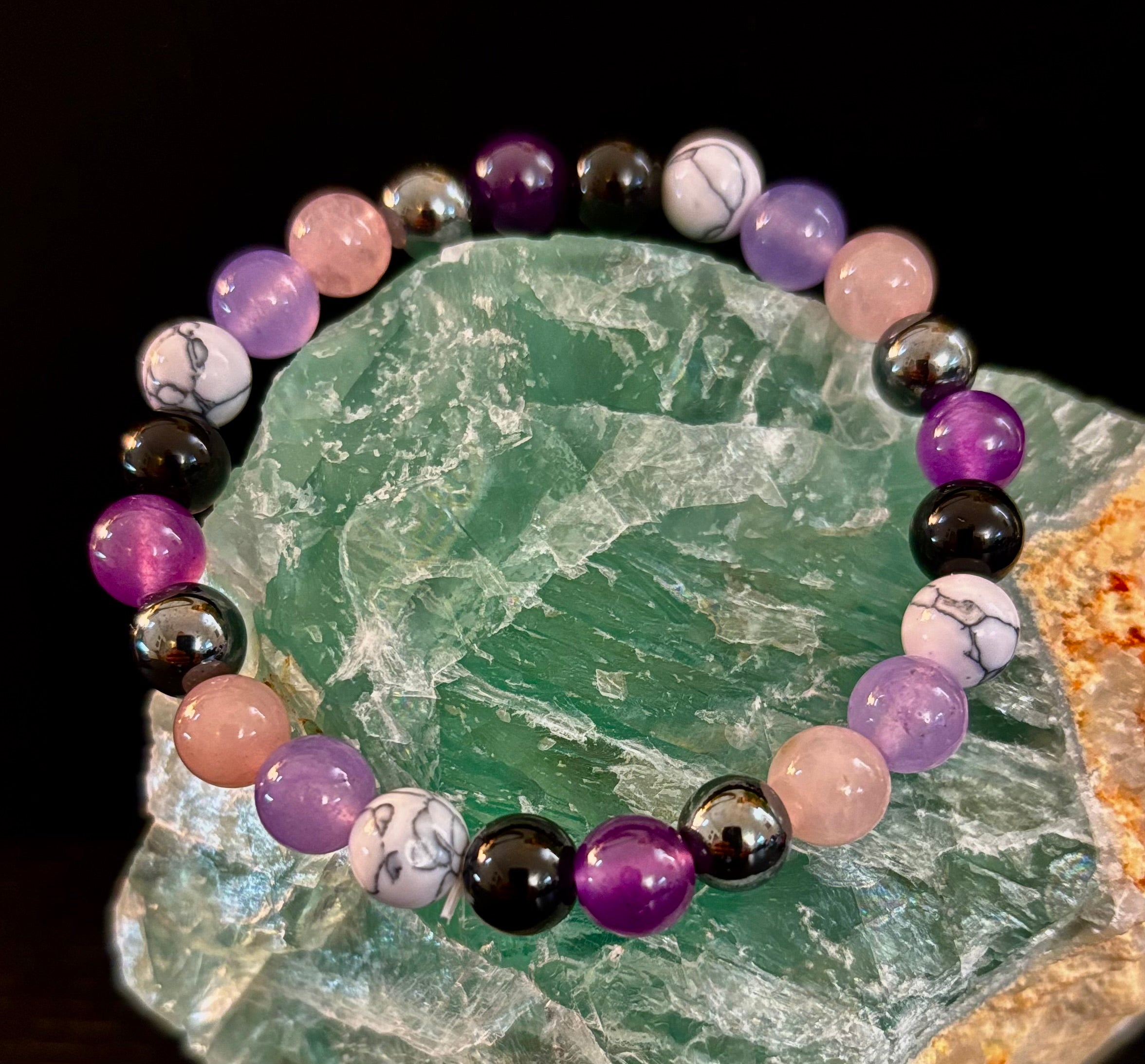 The Empaths Recharge Bracelet (amethyst, Clear Quartz, Rose Quartz, White Howlite, Black Tourmaline) | | Wiccan Center