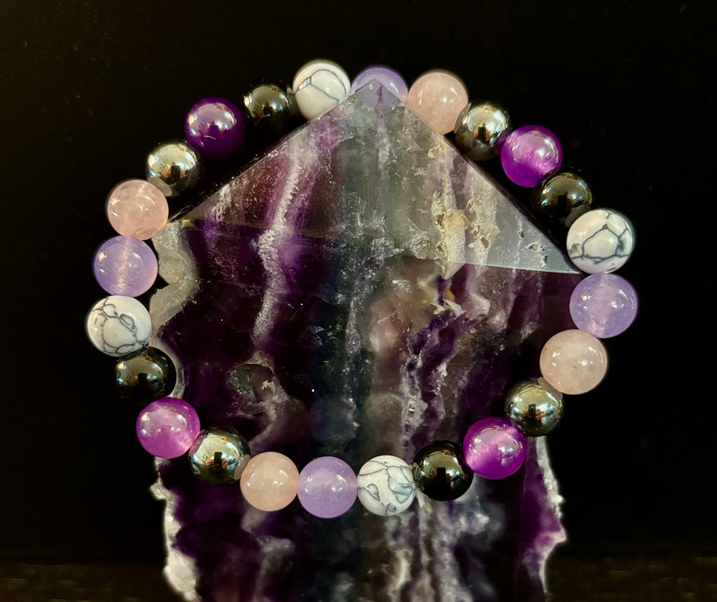 The Empaths Recharge Bracelet (amethyst, Clear Quartz, Rose Quartz, White Howlite, Black Tourmaline) | | Wiccan Center