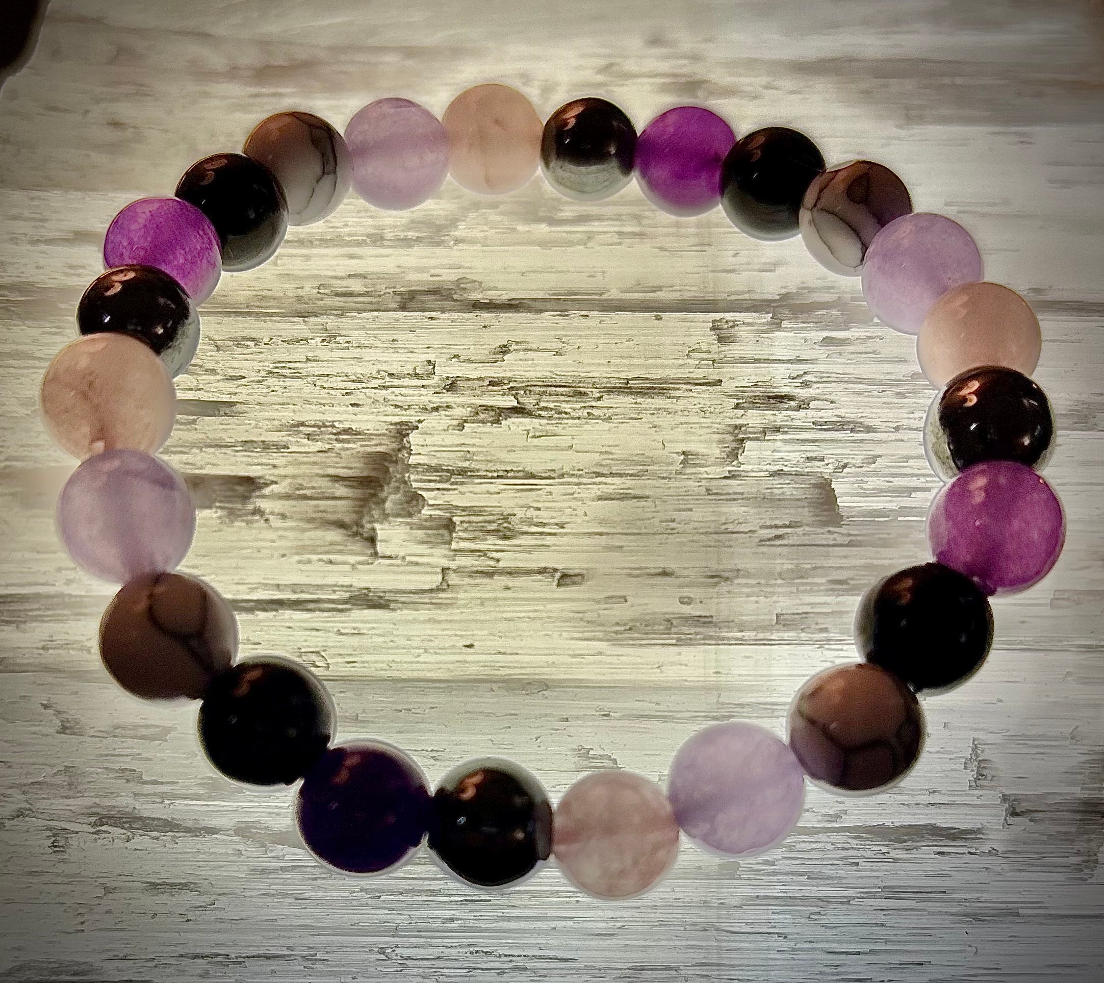 The Empaths Recharge Bracelet (amethyst, Clear Quartz, Rose Quartz, White Howlite, Black Tourmaline) | | Wiccan Center