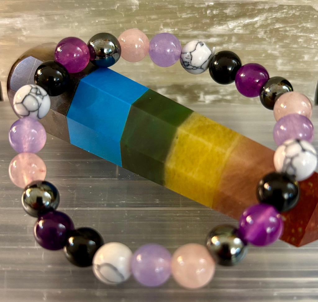 The Empaths Recharge Bracelet (amethyst, Clear Quartz, Rose Quartz, White Howlite, Black Tourmaline) | | Wiccan Center