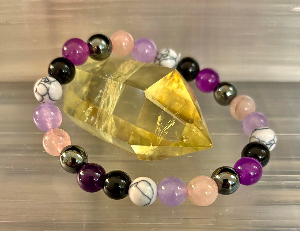 The Empaths Recharge Bracelet (amethyst, Clear Quartz, Rose Quartz, White Howlite, Black Tourmaline) | | Wiccan Center