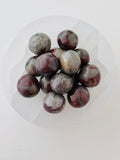 Hematite in Quartz Tumbles | | Wiccan Center