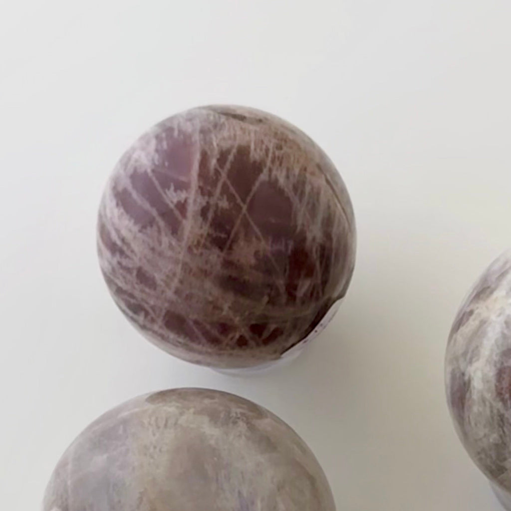 Sunstone in Moonstone Sphere | | Wiccan Center