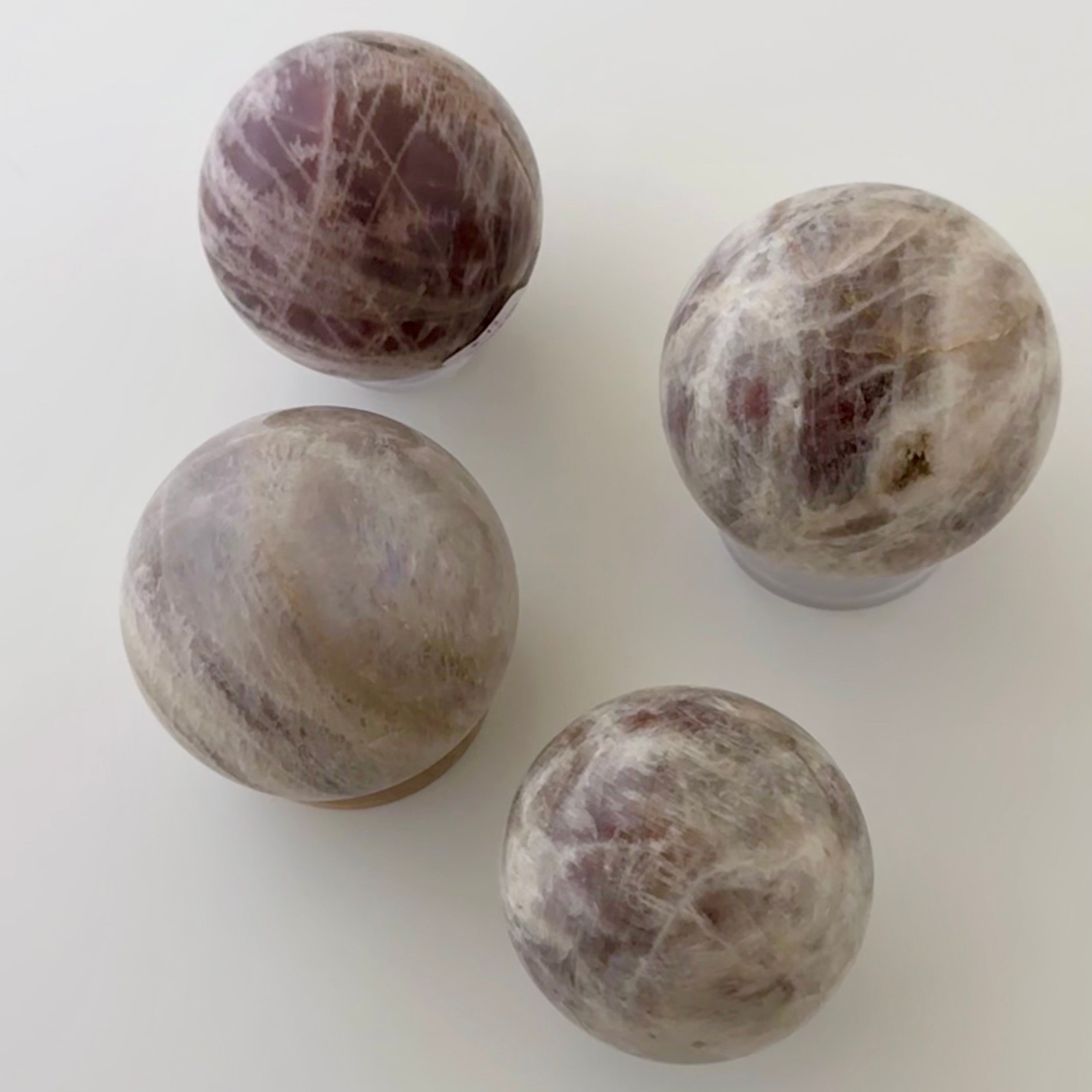 Sunstone in Moonstone Sphere | | Wiccan Center