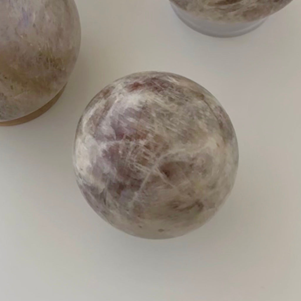 Sunstone in Moonstone Sphere | | Wiccan Center