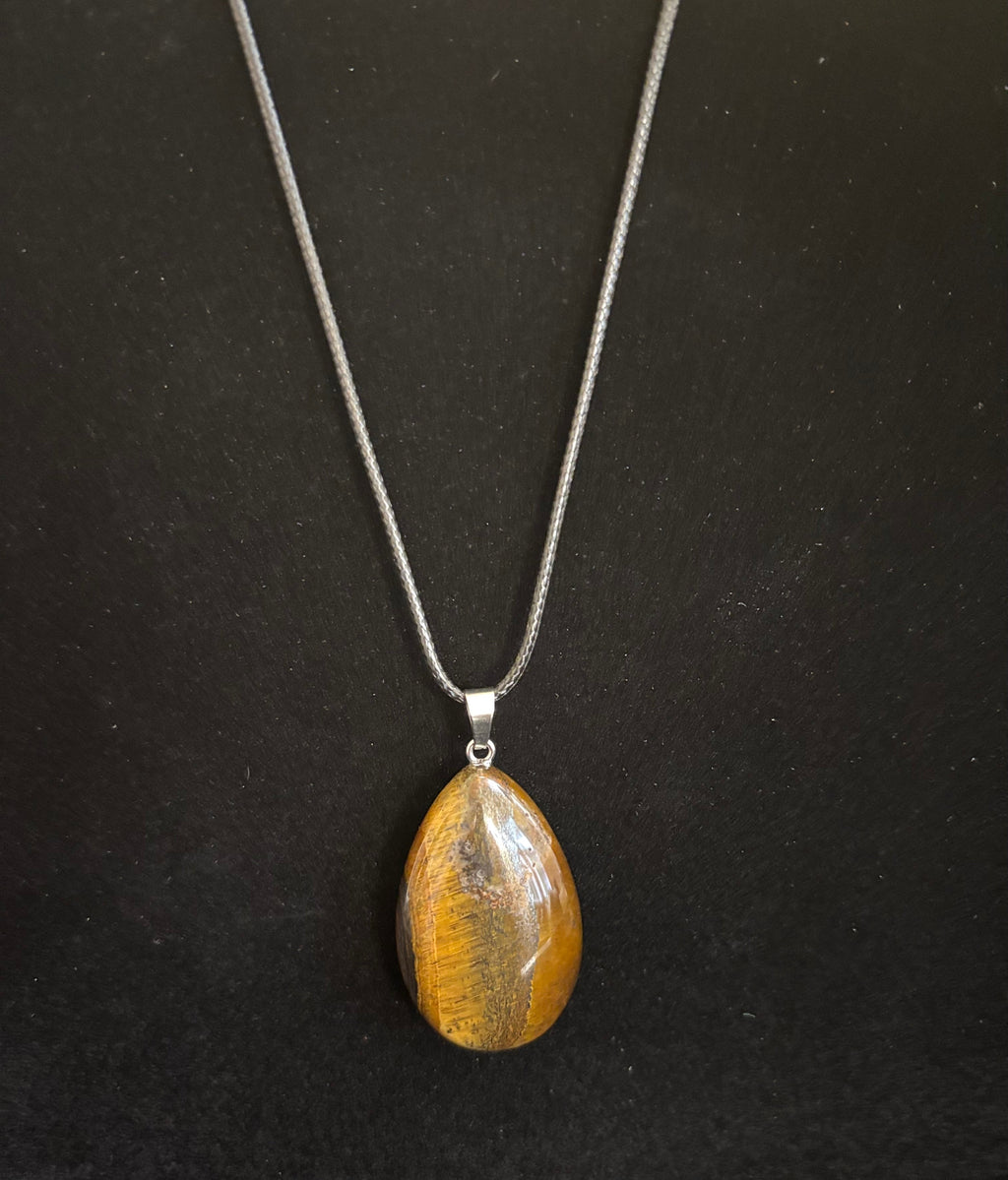 Grounded Elegance: Natural Tiger Eye Leather Pendant Necklace on Leather Rope | | Wiccan Center