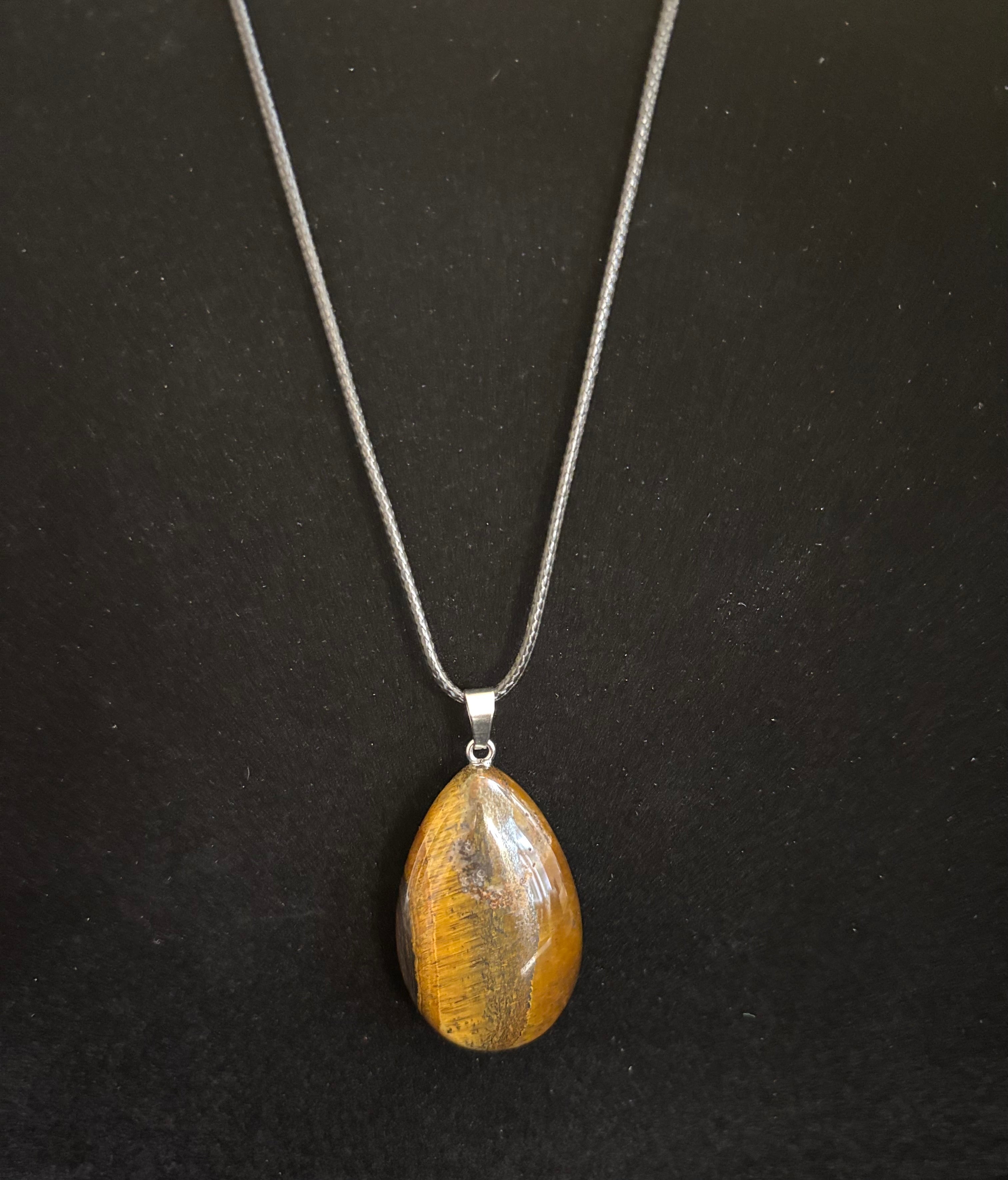 Grounded Elegance: Natural Tiger Eye Leather Pendant Necklace on Leather Rope | | Wiccan Center