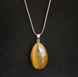 Grounded Elegance: Natural Tiger Eye Leather Pendant Necklace on Leather Rope | | Wiccan Center