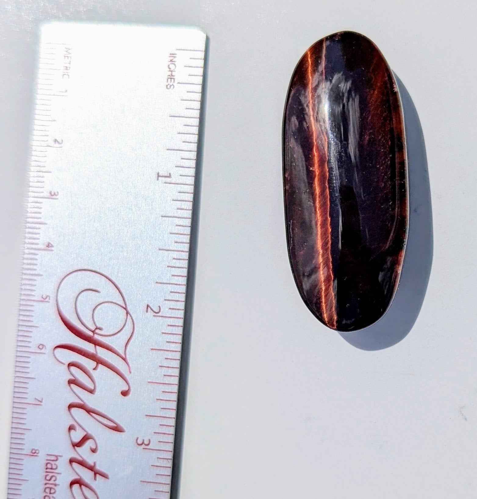 Red Tiger’s Eye Palm Stone – Motivation, Power & Protective Grounding | | Wiccan Center