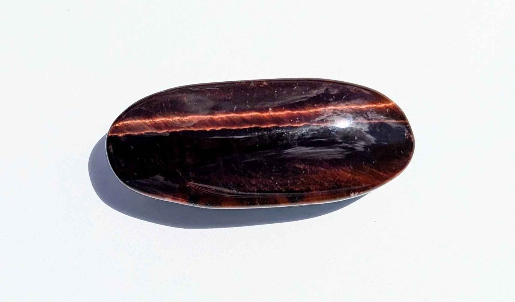 Red Tiger’s Eye Palm Stone – Motivation, Power & Protective Grounding | | Wiccan Center