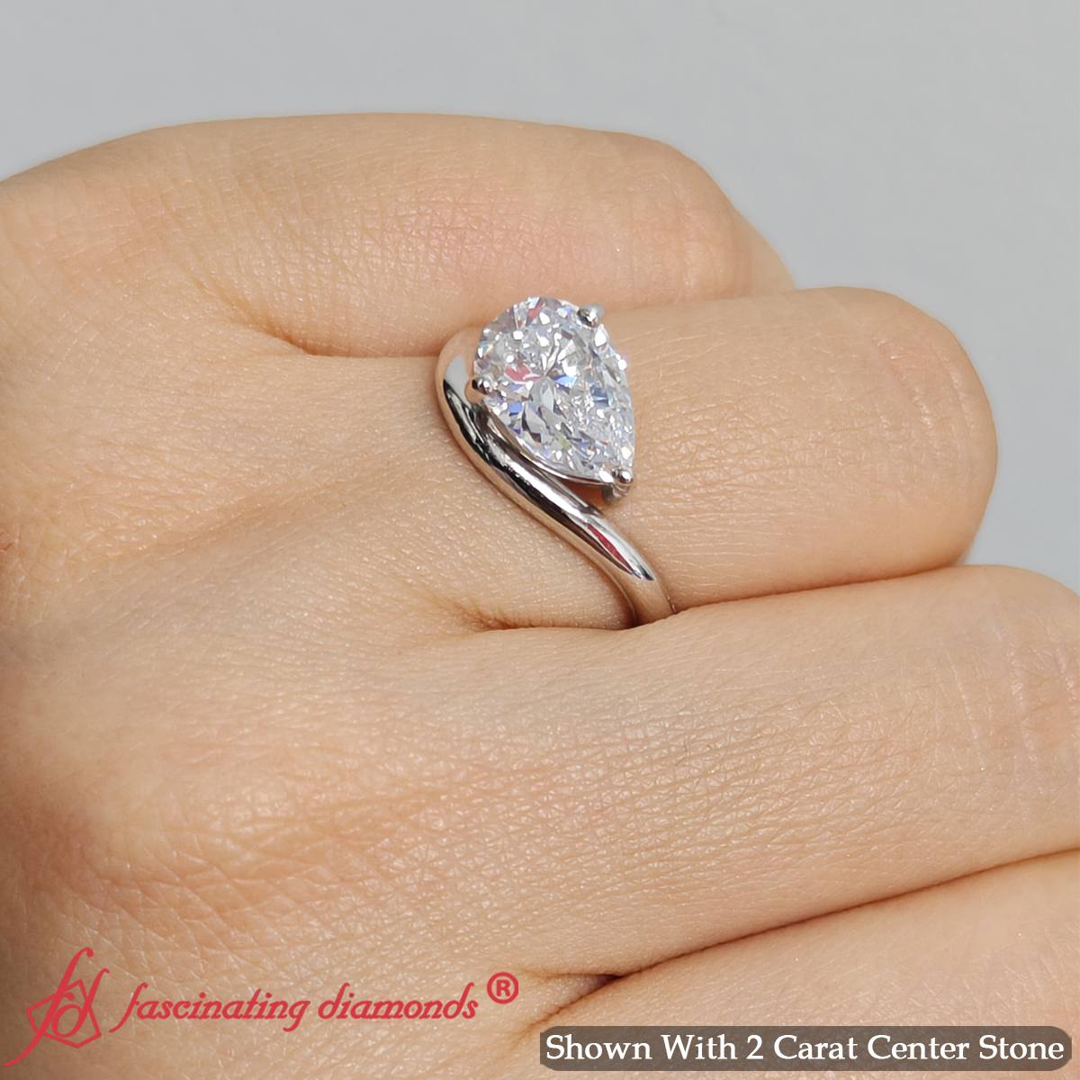 Curve Wave Pear Shaped Solitaire Diamond Ring