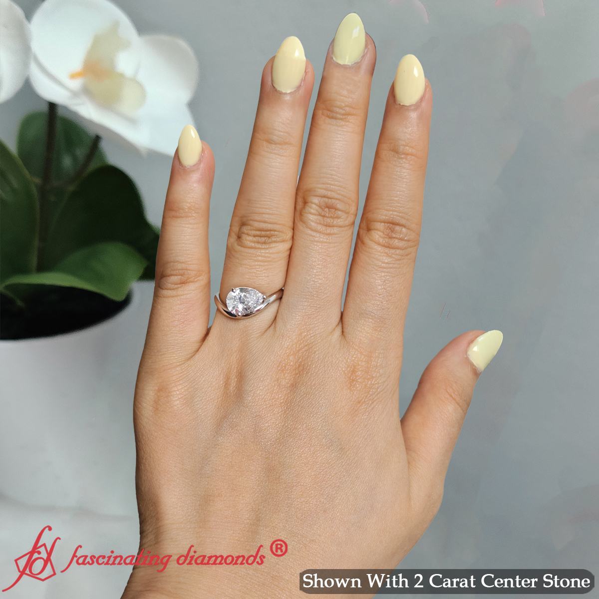Curve Wave Pear Shaped Solitaire Diamond Ring
