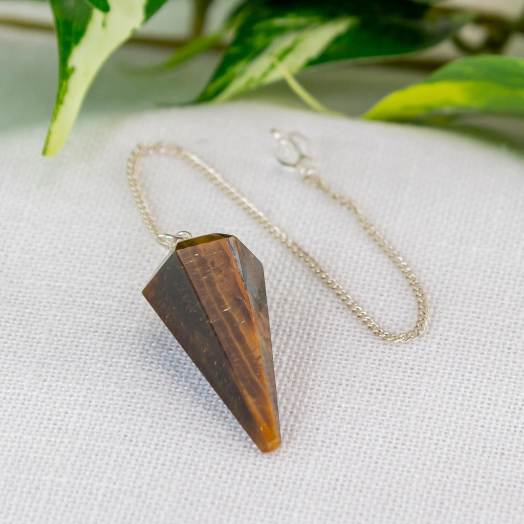 Tiger’s Eye Faceted Pendulum | | Wiccan Center