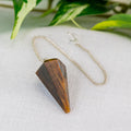 Tiger’s Eye Faceted Pendulum | | Wiccan Center