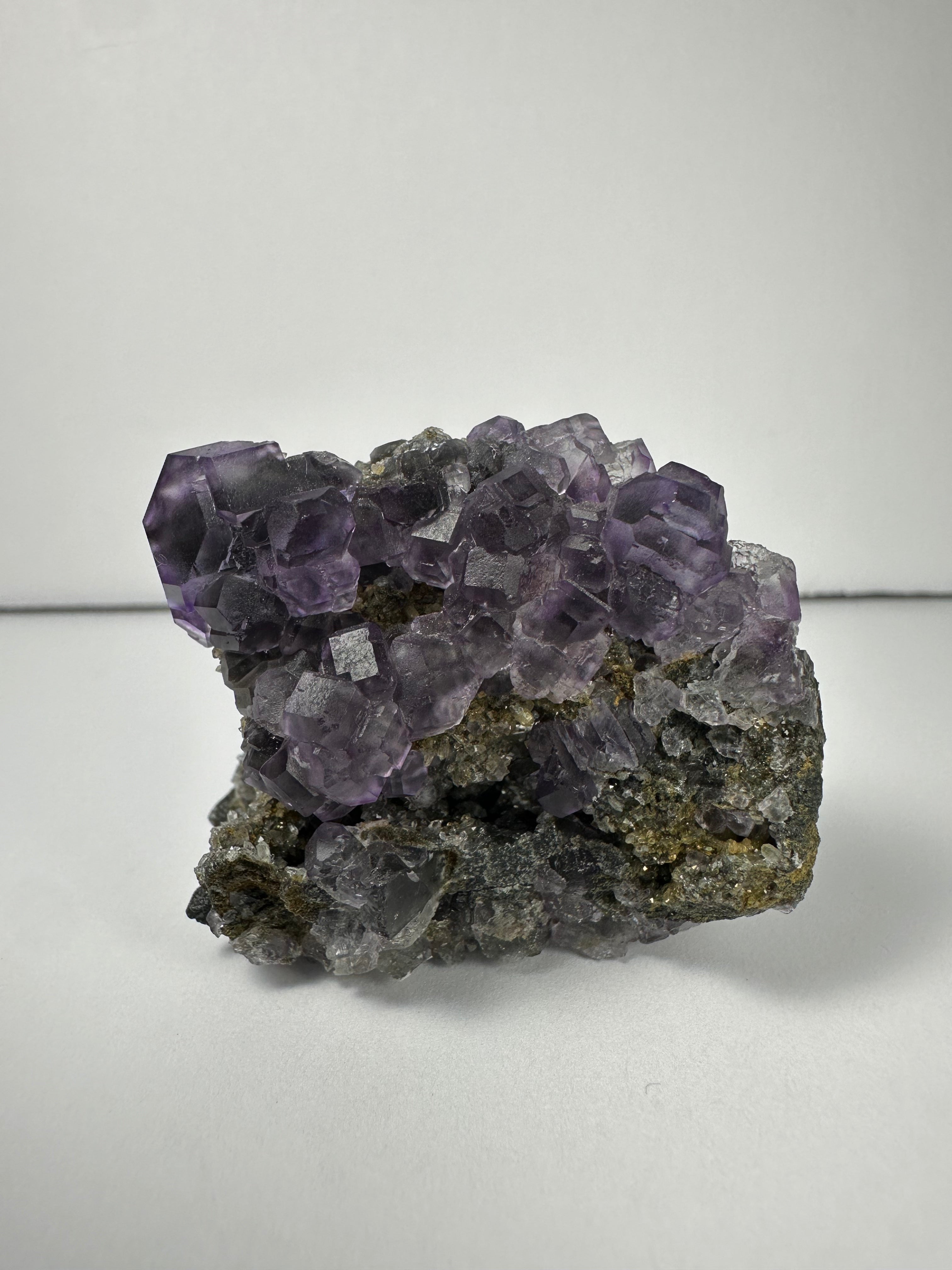 Purple Dodecahedral Fluorite with Calcite on matrix | Minerals | Wiccan Center