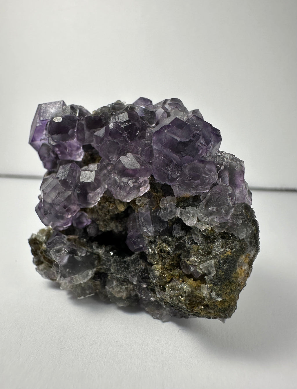 Purple Dodecahedral Fluorite with Calcite on matrix | Minerals | Wiccan Center