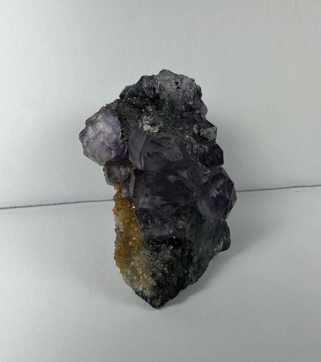 Purple Dodecahedral Fluorite with Calcite on matrix | Minerals | Wiccan Center