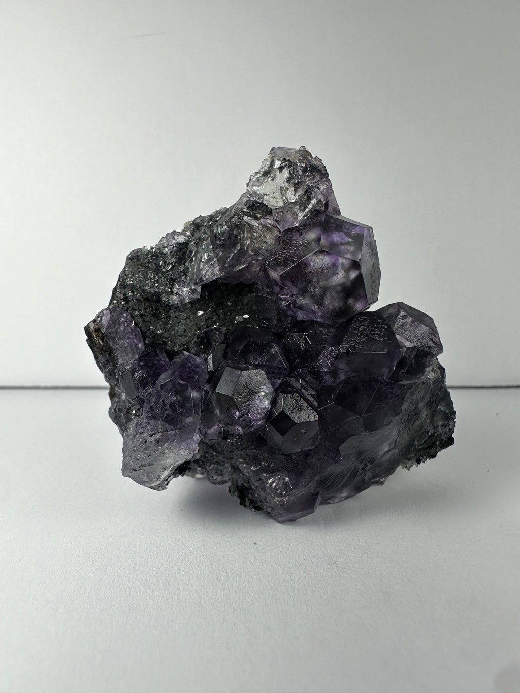 Purple Dodecahedral Fluorite with Calcite on matrix | Minerals | Wiccan Center