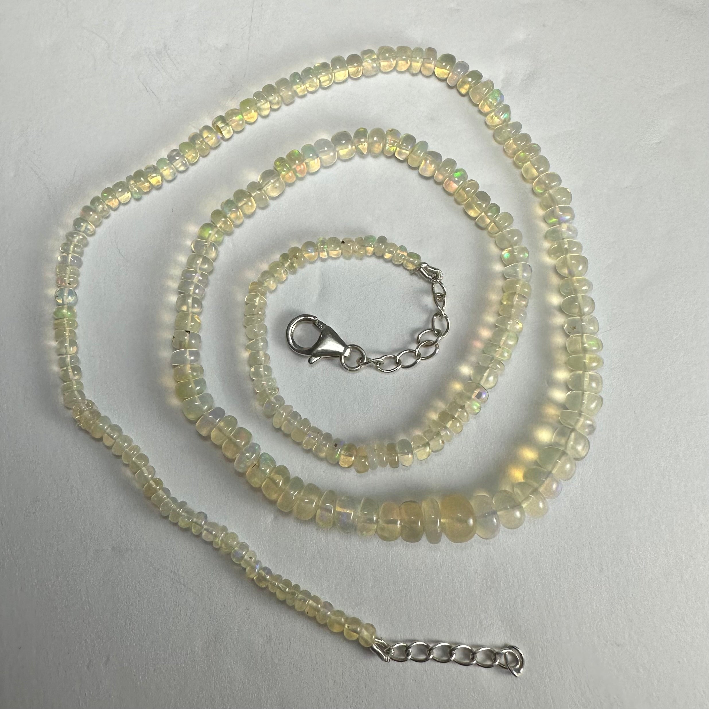 Welo Opal Graduated Bead Necklace Ethiopia | Jewelry | Wiccan Center