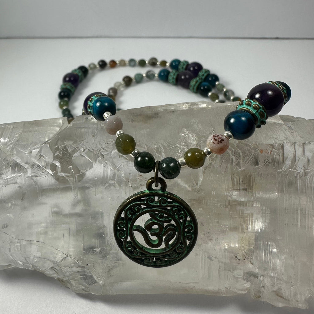Bronze Patina 'Om' Pendant on Mixed Bead Necklace | Jewelry | Wiccan Center